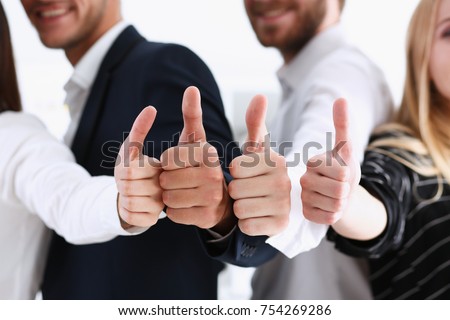 Group of people show ok or confirm with thumb up during conference closeup. High level quality product serious offer excellent education mediation solution creative advisor participation concept Royalty-Free Stock Photo #754269286