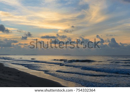 Beautiful sunrise on the beach in Thailand province. Clouds on sky