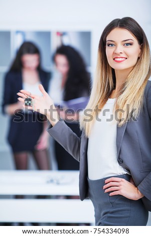 smiling woman  signing documents at bank with agent