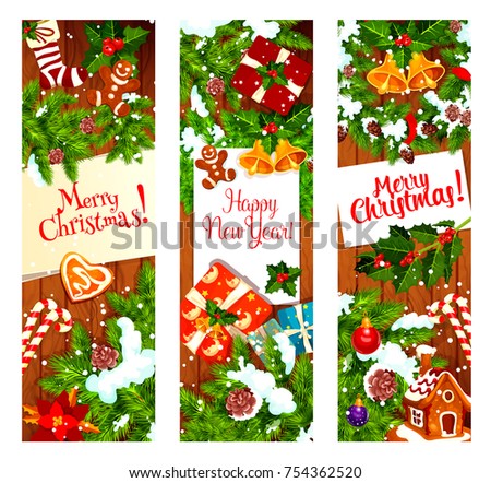 Christmas and New Year holiday festive wreath on wooden background. Xmas gift, holly and pine tree branch, Santa bell, candy and ball, cookie, sock, snowflake and poinsettia greeting banner design