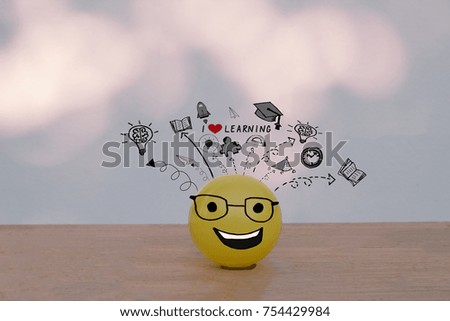 Happy smiley yellow ball  wearing glasses with education and learning doodles - I love learning concept