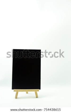 Small plain blackboard on white background. Notice and wish concept.