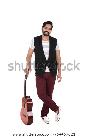 Happy musician man posing with a guitar, isolated on white background.