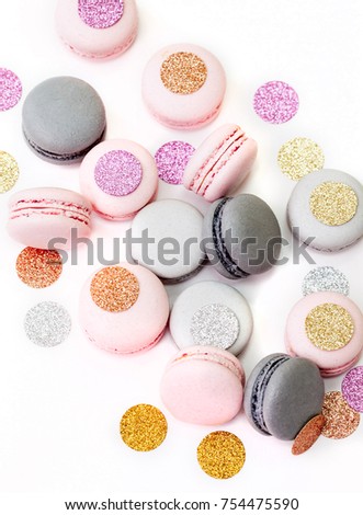 Holiday macarons cookies with sparkling decoration. Isolated on white
Christmas sweets.