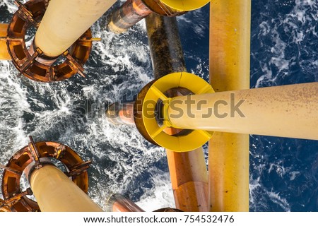 Offshore drill yellow oil and gas production petroleum pipeline. Royalty-Free Stock Photo #754532476
