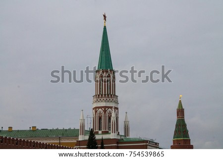 Nikolskaya Tower of Moscow Kremlin in autumn over grey sky