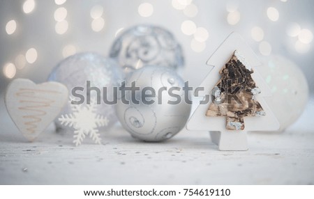Silver Christmas balls with tre heart adn snowflake