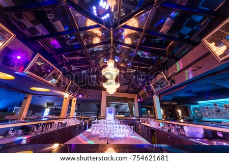 Luxury chandelier lights at empty bar counter