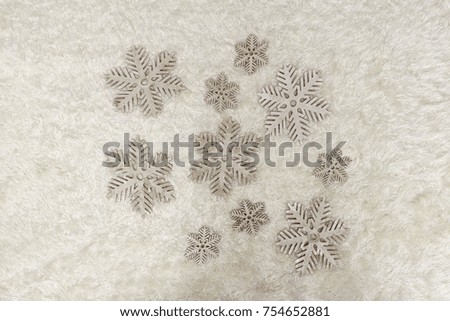 Snowflakes Christmas Decorations on Furry Background