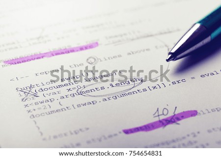 paper with programming code and programmer notes