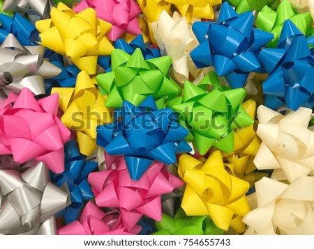 Colorful bow for gift boxes With the concept of happiness, New Year, Celebration, Valentines,Gift, giving, love, Happy Holidays, warmth, family