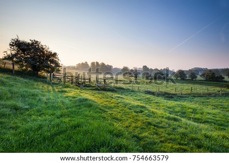 Footpath from Widford to Swinbrook, Oxfordshire on a Spring morning. Royalty-Free Stock Photo #754663579
