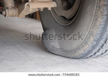 Tire swelling due to expiration Royalty-Free Stock Photo #754688581