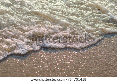 Sand and water on Bangsan beach at Chonburi, Thailand