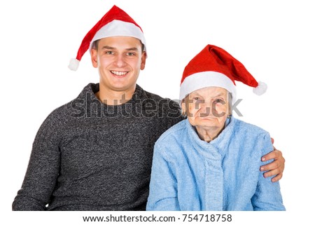 Picture of an old lady celebrating Christmas with her grandson