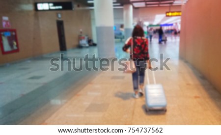 Blur tourist in transport station,