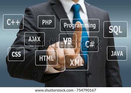 Businessman CEO hand touching  virtual panel of programming languages, Computer technology concept