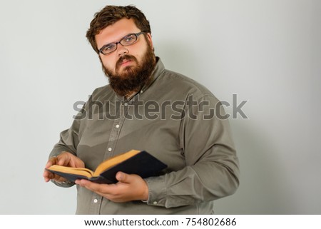 A portrait of a praying man isolated on gray background