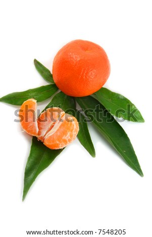 Juicy tangerine with foliage isolated over white backgroung + Clipping path. Christmas fruit number one !