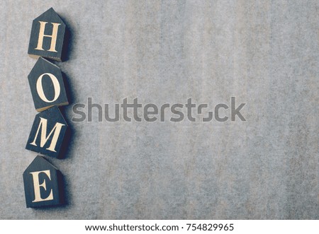 Home Wooden Letters on Grey Background