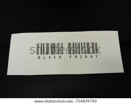 Blag Friday with barcode, in black letters on white and black background.
