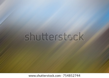 Light abstract gradient motion blurred background. Colorful lines texture wallpaper