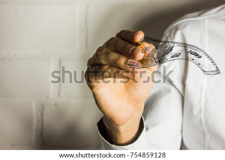 hands in the foreground with money