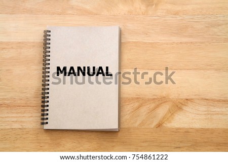 User manual or Instruction manual book on wooden desk Royalty-Free Stock Photo #754861222