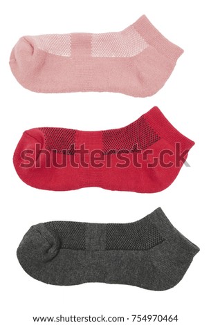 Pink red and grey socks isolated on white background
