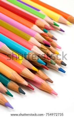 Tip of Colored Crayons on White Background