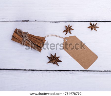 cinnamon sticks and paper tag