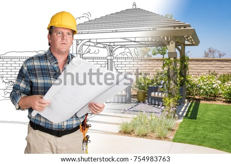 Male Contractor With House Plans Wearing Hard Hat In Front of Custom Pergola Patio Covering Drawing Photo Combination