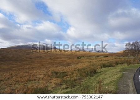 This photo shows a wonderful and nice nature in Scotland, UK. This picture was taken in Autumn so the color of plants have a bit orange and brown. It is such a lovely place. 