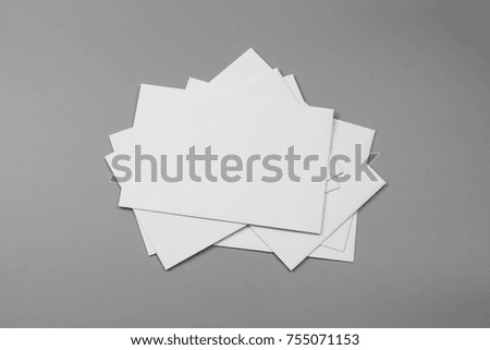 Blank portrait. changeable background / white paper isolated on gray. identity design, corporate templates, company style, set of booklets, blank white folding paper flyer