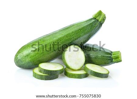 fresh green zucchini with slice isolated on white background Royalty-Free Stock Photo #755075830