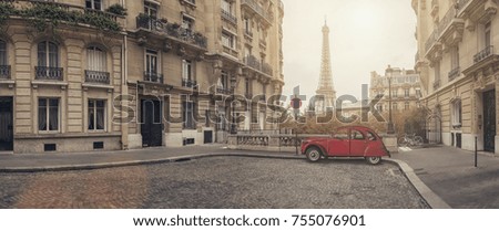 small street in paris with view on the famous Eiffel tower - panorama Royalty-Free Stock Photo #755076901
