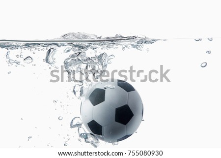 Soccer ball drop and splash into water