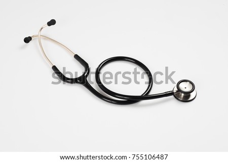 Stethoscope placed on a white background.