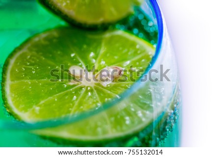 lemon soda juice with a slice of lemon floating.. close up shoot 