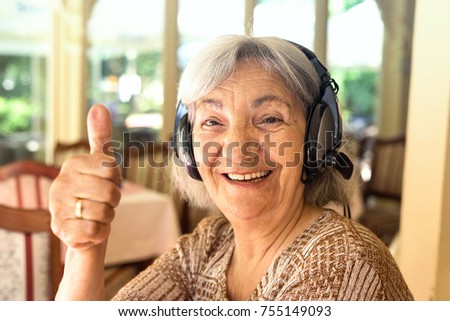 senior woman listening music