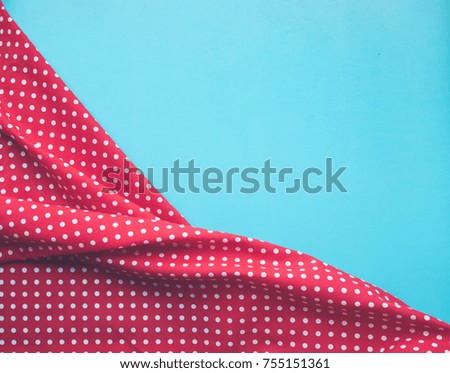 Dots red fabric cloth with blue background.For decoration key visual layout