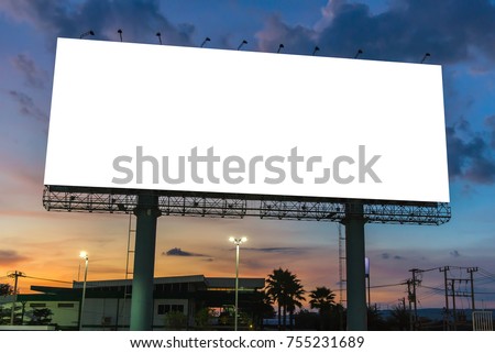 Blank billboard at twilight time ready for new advertisement.