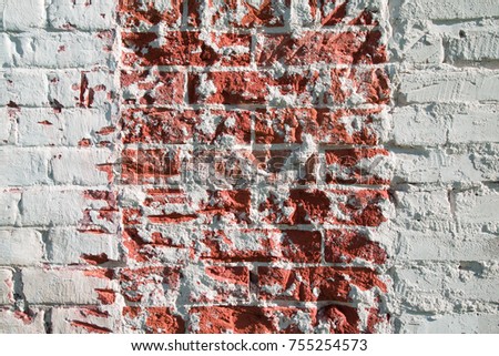 Detail shot of cracked vintage old brick wall for background. Red and white texture. Lines on picture