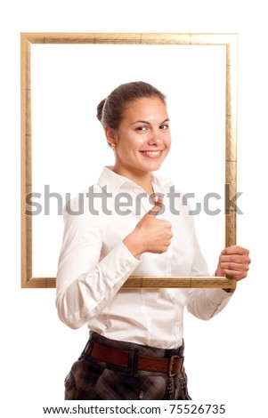 a young businesswoman holding looking through a pictureframe showing thumb up