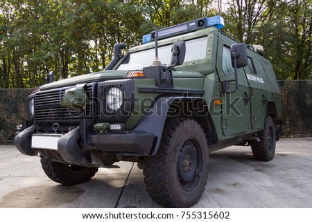 german armored military police vehicle stands on platform