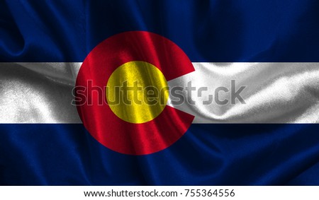 Flags from the USA on fabric ; State of Colorado
