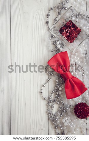 holiday decorations on white wood background and copy space