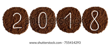 2018 decorated with ground coffee on white background