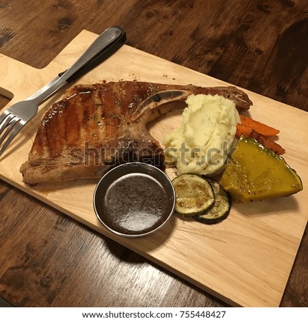 grilled pork chop in chiangmai Royalty-Free Stock Photo #755448427