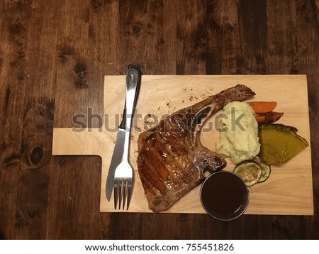 grilled pork chop in chiangmai Royalty-Free Stock Photo #755451826